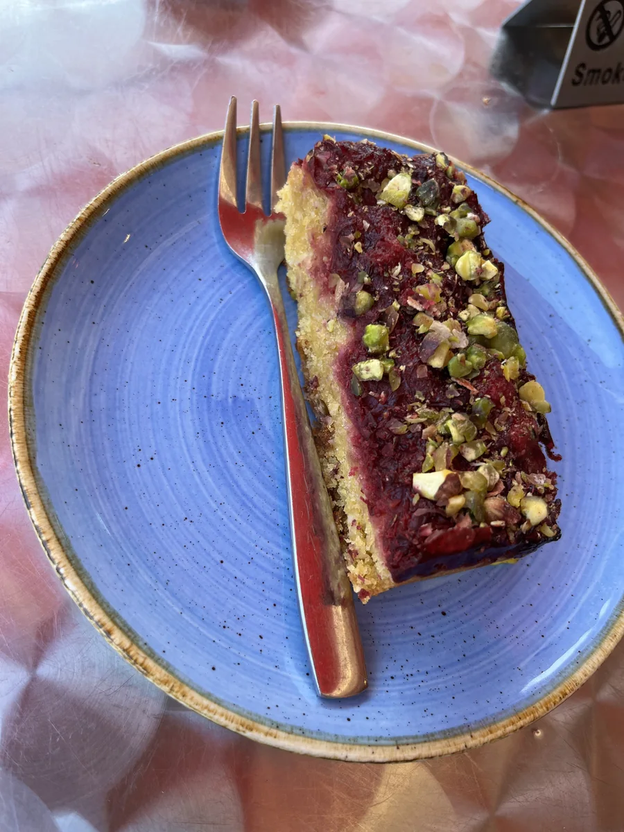 A fresh raspberry and pistachio bake