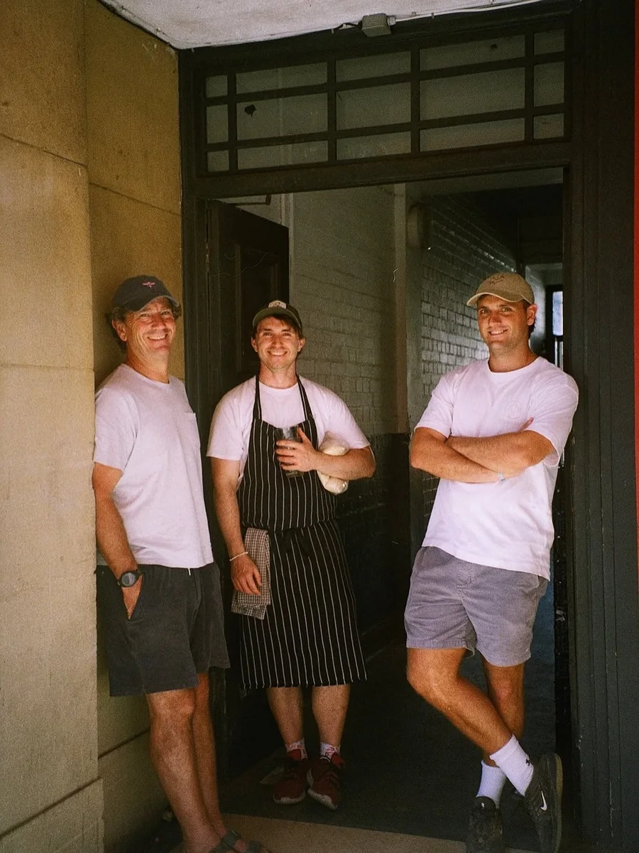 The Common Beaver team at the cafe entrance